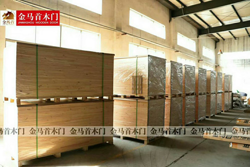 木门厂家金马首因环保设施齐全生产得到保证接单不断